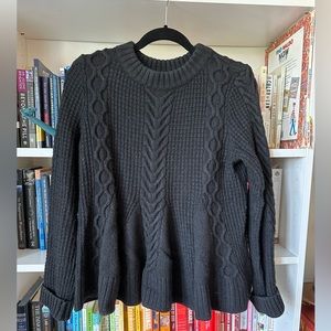 Elizabeth and James M Lightly worn black knit peplum sweater